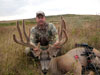 A mule deer with Jared Stefanyshyn from Preeceville Archery Products, 306-547-3133